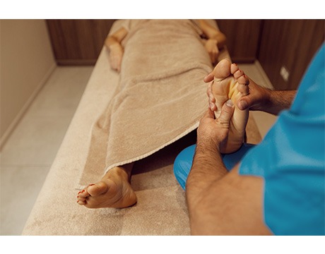 Massage the foot